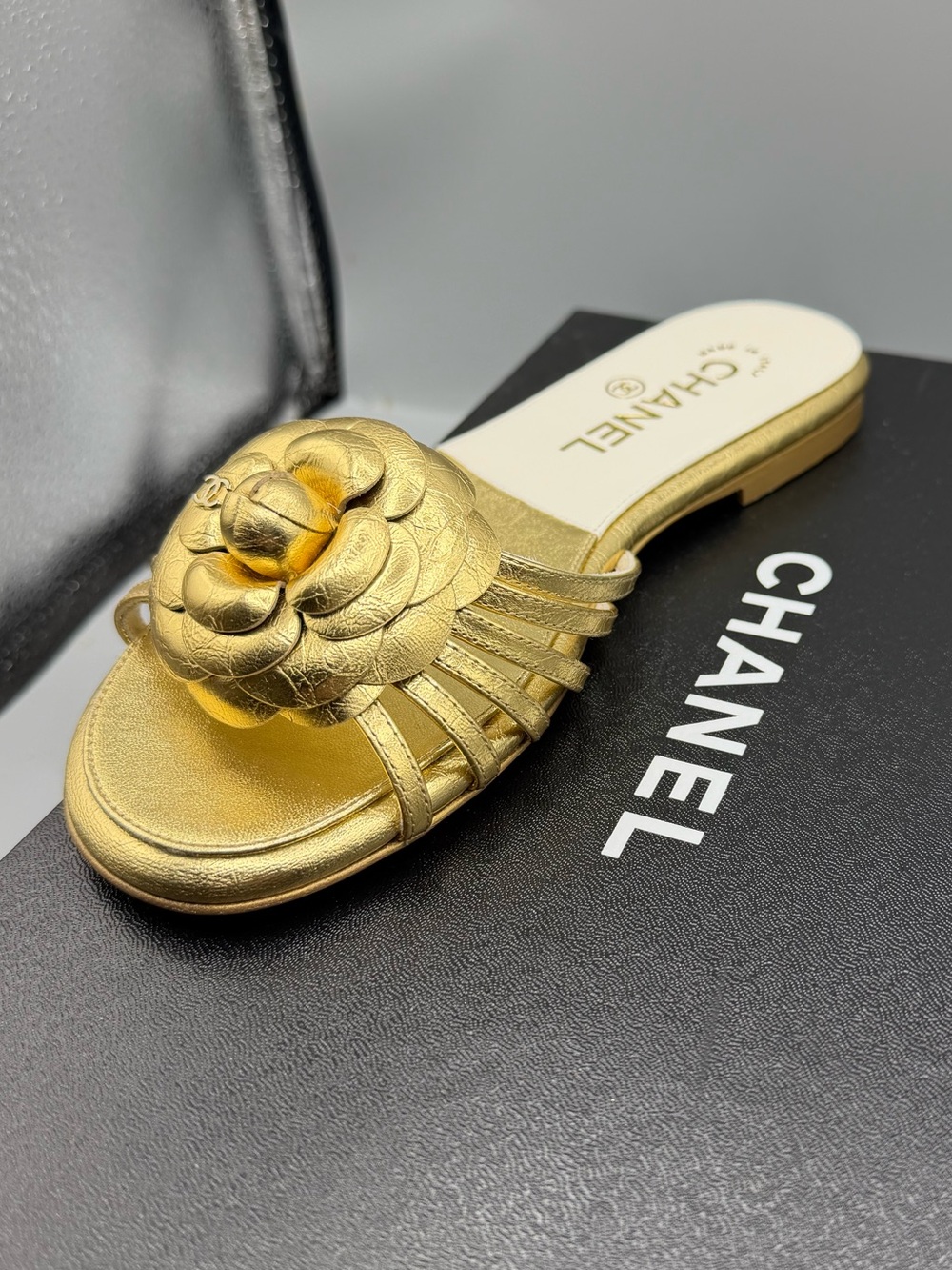 CHANEL Metallic Gold Camellia Slide